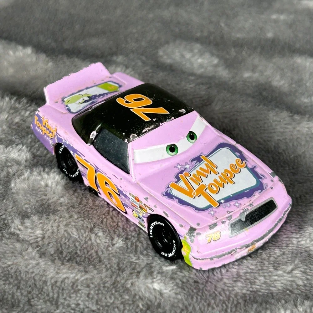 Disney Pixar Cars Crusty Rotor 76 Vinyl Toupee Diecast Toy Car Lilac Purple